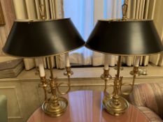 Two brass candelabrum style table lamps with metal shades