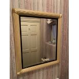 Gilt wood framed bevelled edge wall mirror