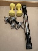 Set of Gold's Gym weight plates, and a Bullworker X5.