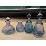 Pair of Caithness scent bottles with another, and a small vase