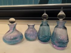 Pair of Caithness scent bottles with another, and a small vase