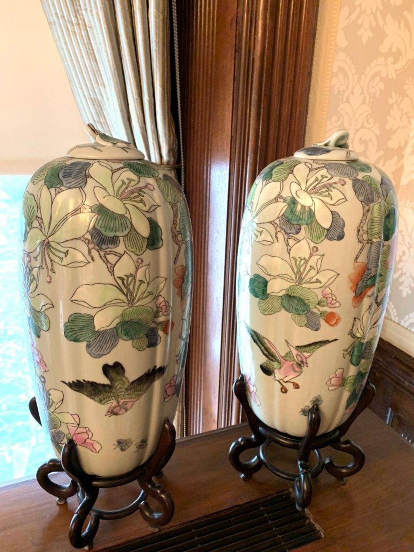 Pair of gourd shaped lidded vases