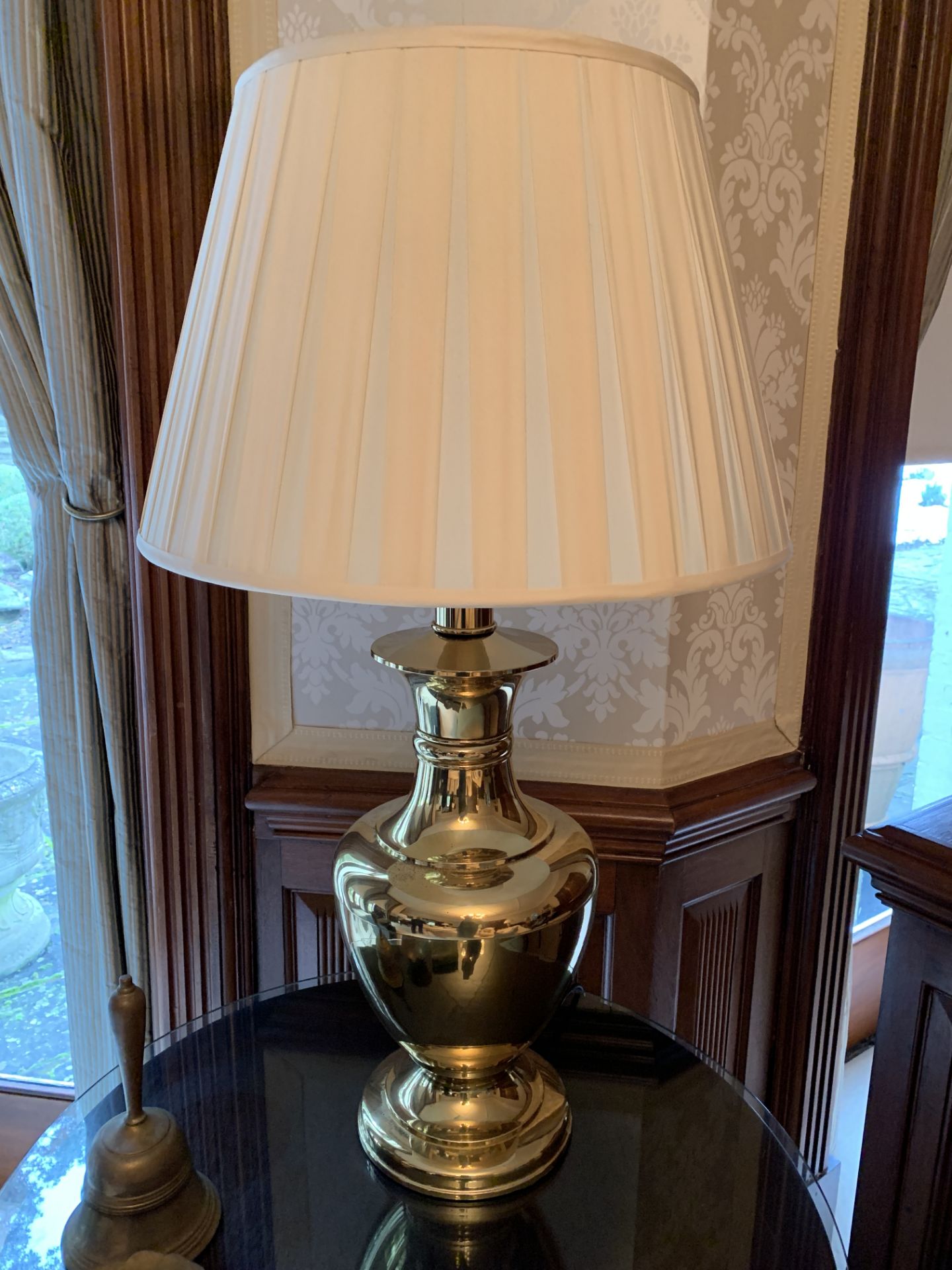 Two brass urn shaped table lamps