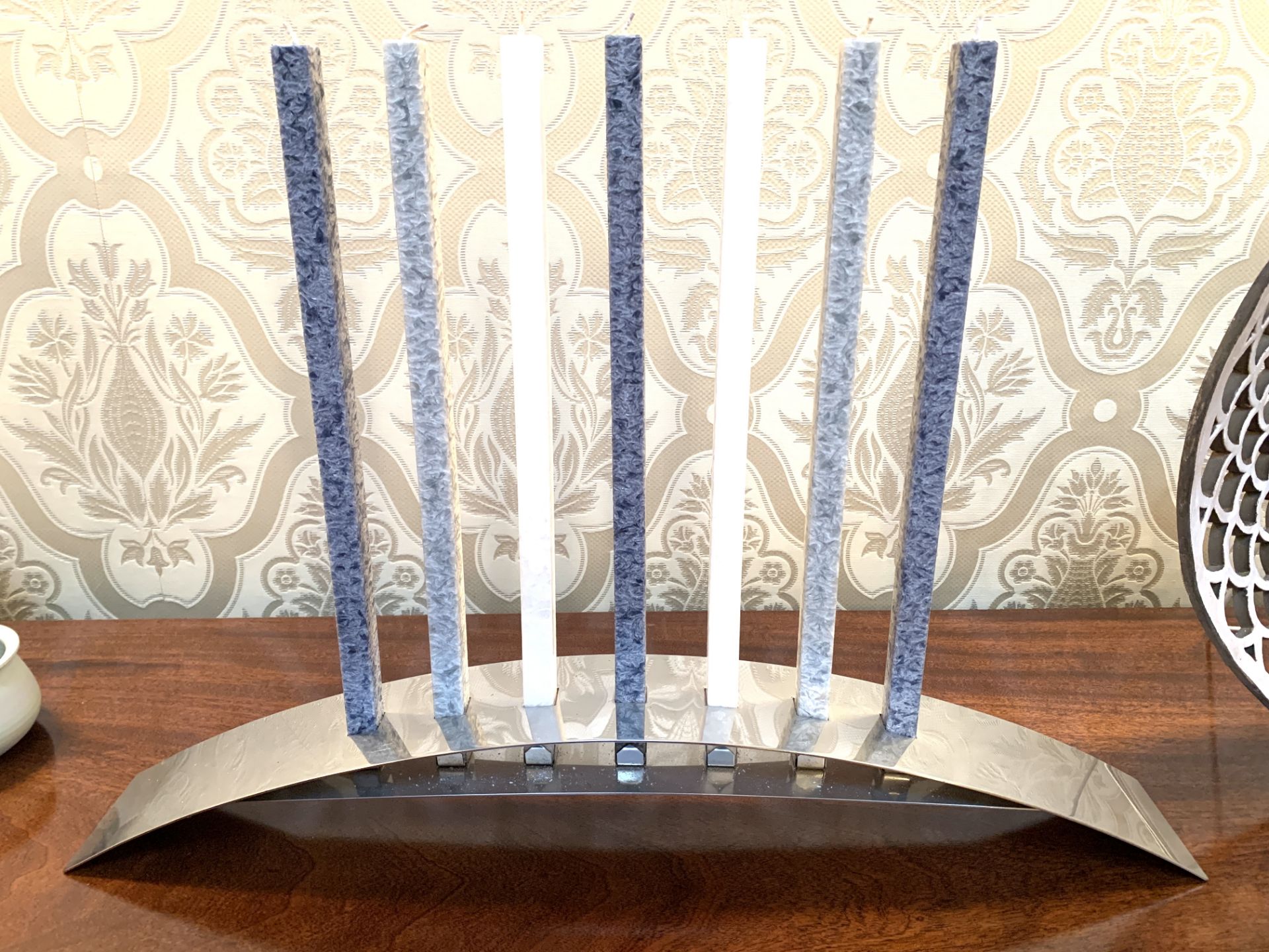 Chrome curved candle holder and candles