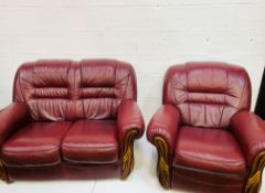 Red leather two seat sofa and matching electric reclinable chair