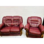Red leather two seat sofa and matching electric reclinable chair