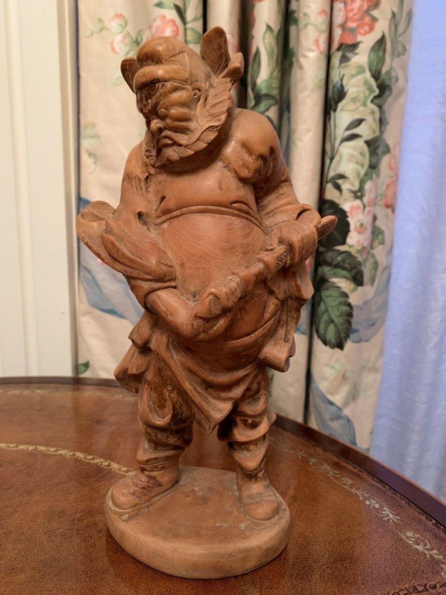 Wooden carving of a Samurai