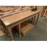 Limed oak side table on six column supports