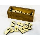 Complete set of bone and ebony dominoes in original box