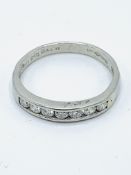 Platinum and diamond half eternity ring