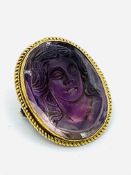 Gold and amethyst cameo with a lady's face