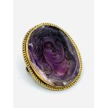 Gold and amethyst cameo with a lady's face