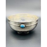 Hammered silver bowl with three blue cabochons to outside rim