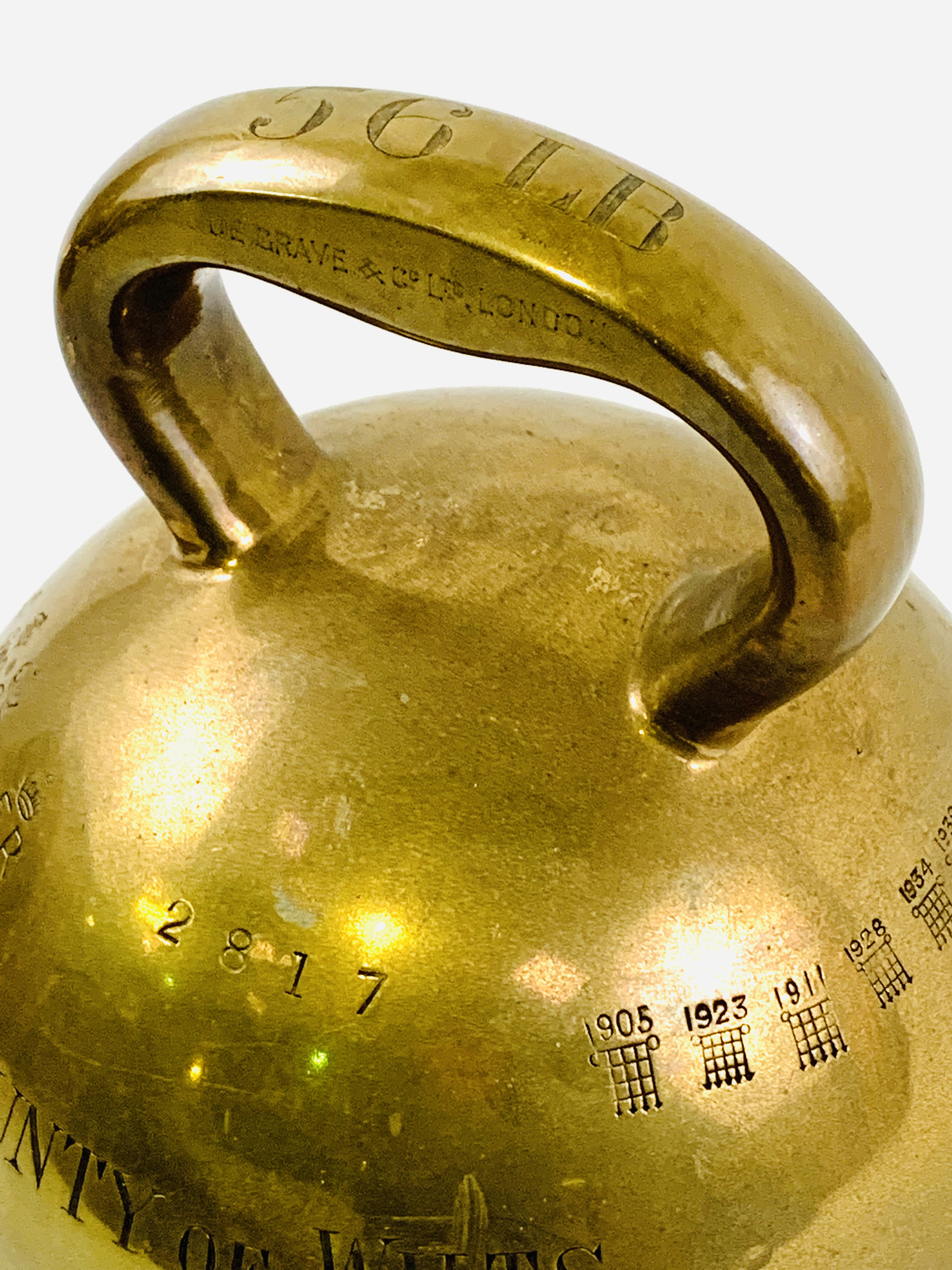 Brass alloy 56lbs proof weight in the shape of a dumbbell - Image 3 of 5
