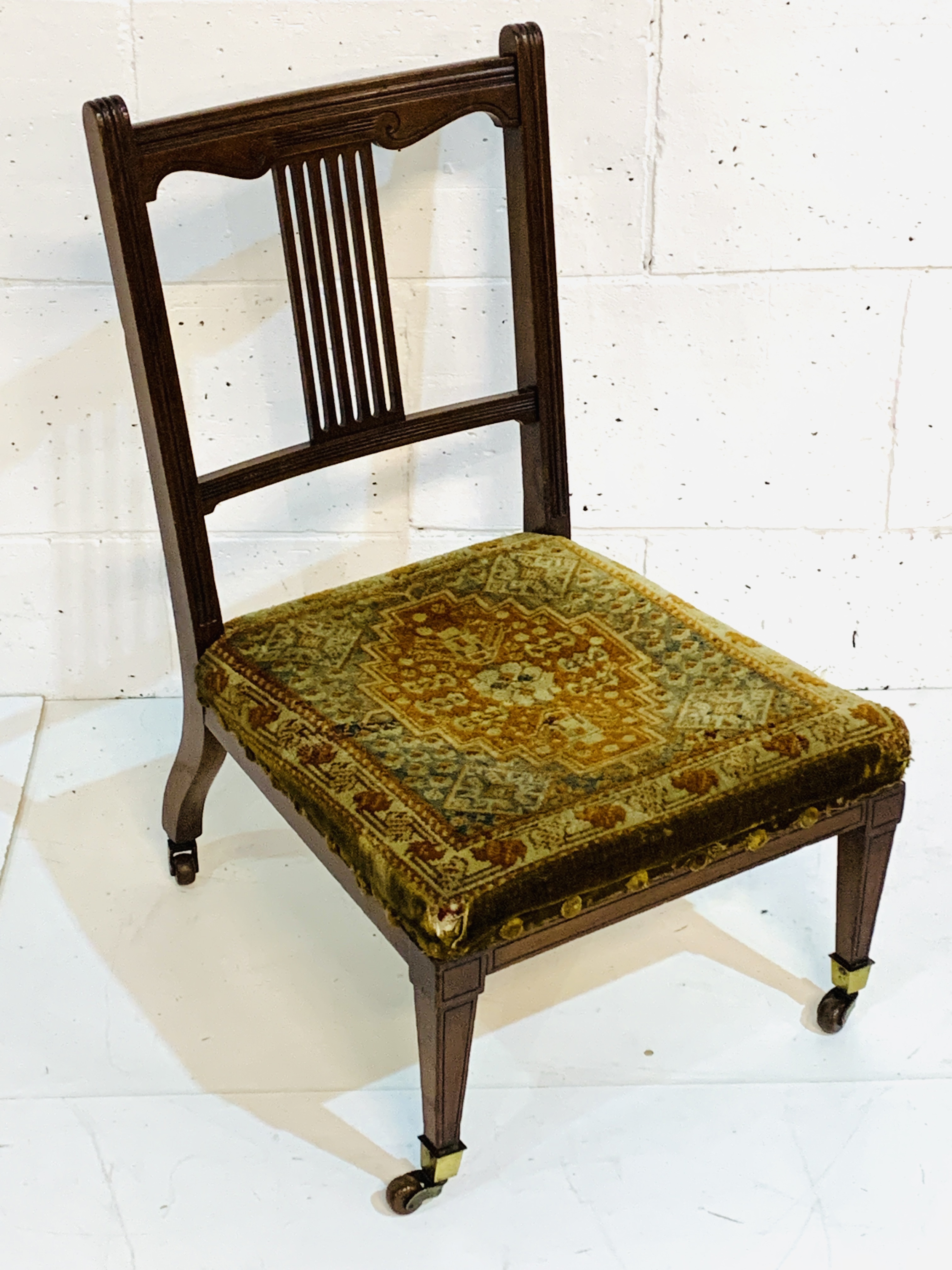 Edwardian mahogany nursing chair