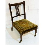 Edwardian mahogany nursing chair