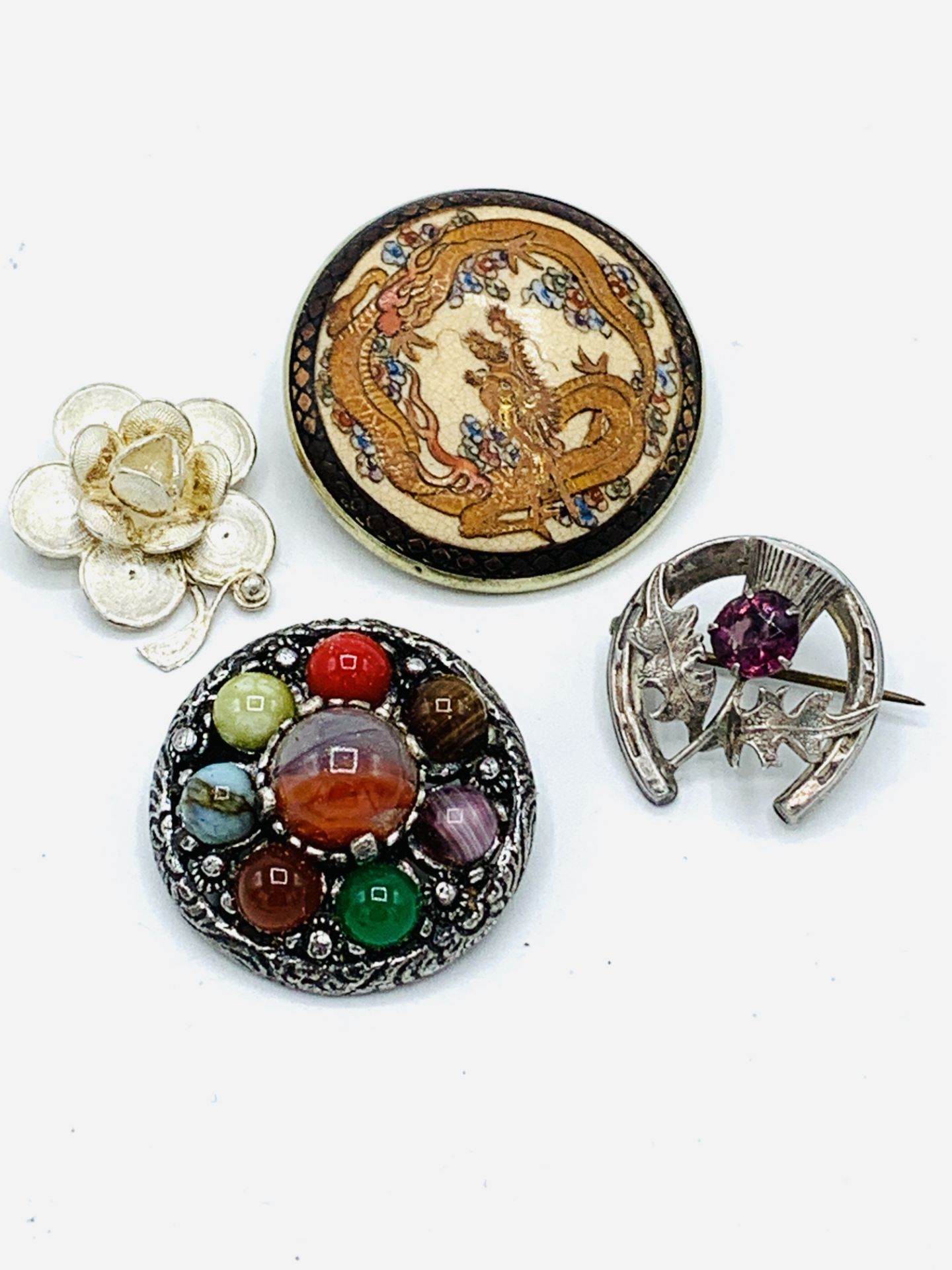 Four brooches
