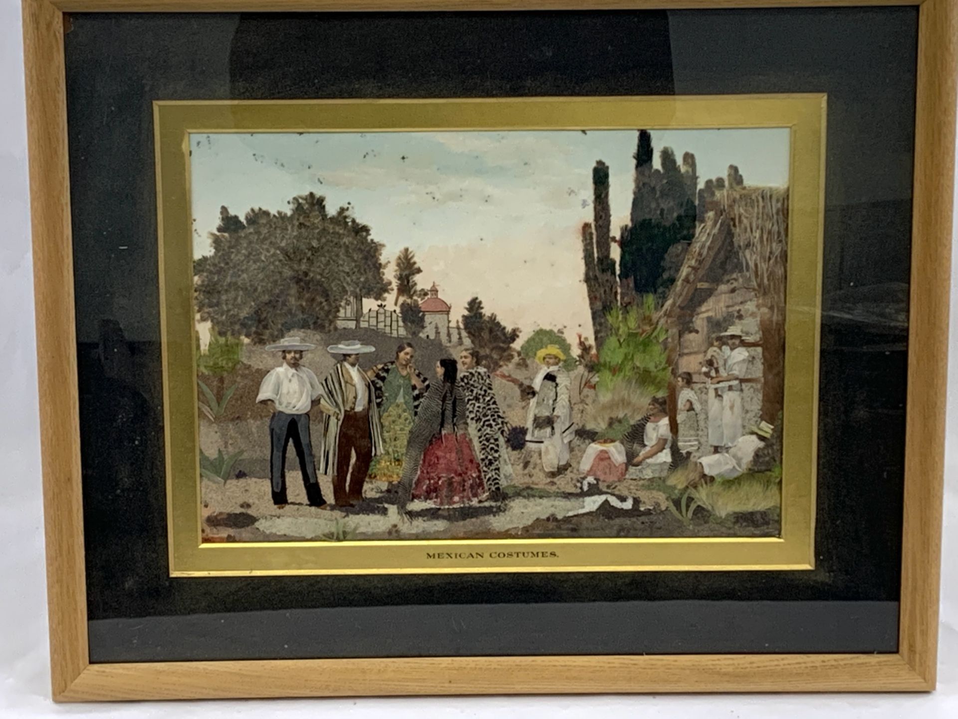 Framed and glazed mixed media painting entitled "Mexican Costumes"