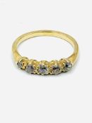 18ct gold (tests as) diamond 5 stone ring