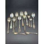 Four silver condiment spoons, six sterling silver teaspoons, and three silver plated teaspoons
