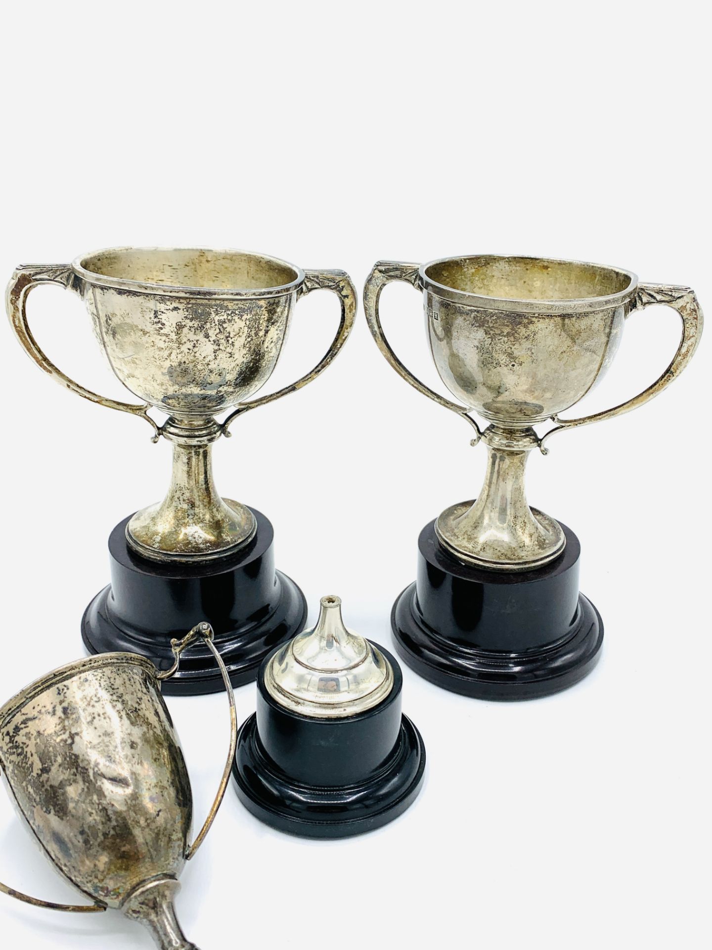 Two hallmarked silver 1930s 2 handled trophies, and a silver trophy with broken stem