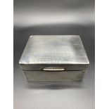 Hallmarked silver cigarette box, and a silver card case
