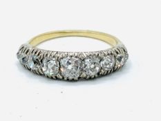 Gold half looped diamond ring