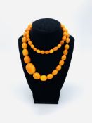 Graduated amber bead necklace