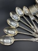 A large quantity of EPNS flatware, including a wooden canteen of cutlery