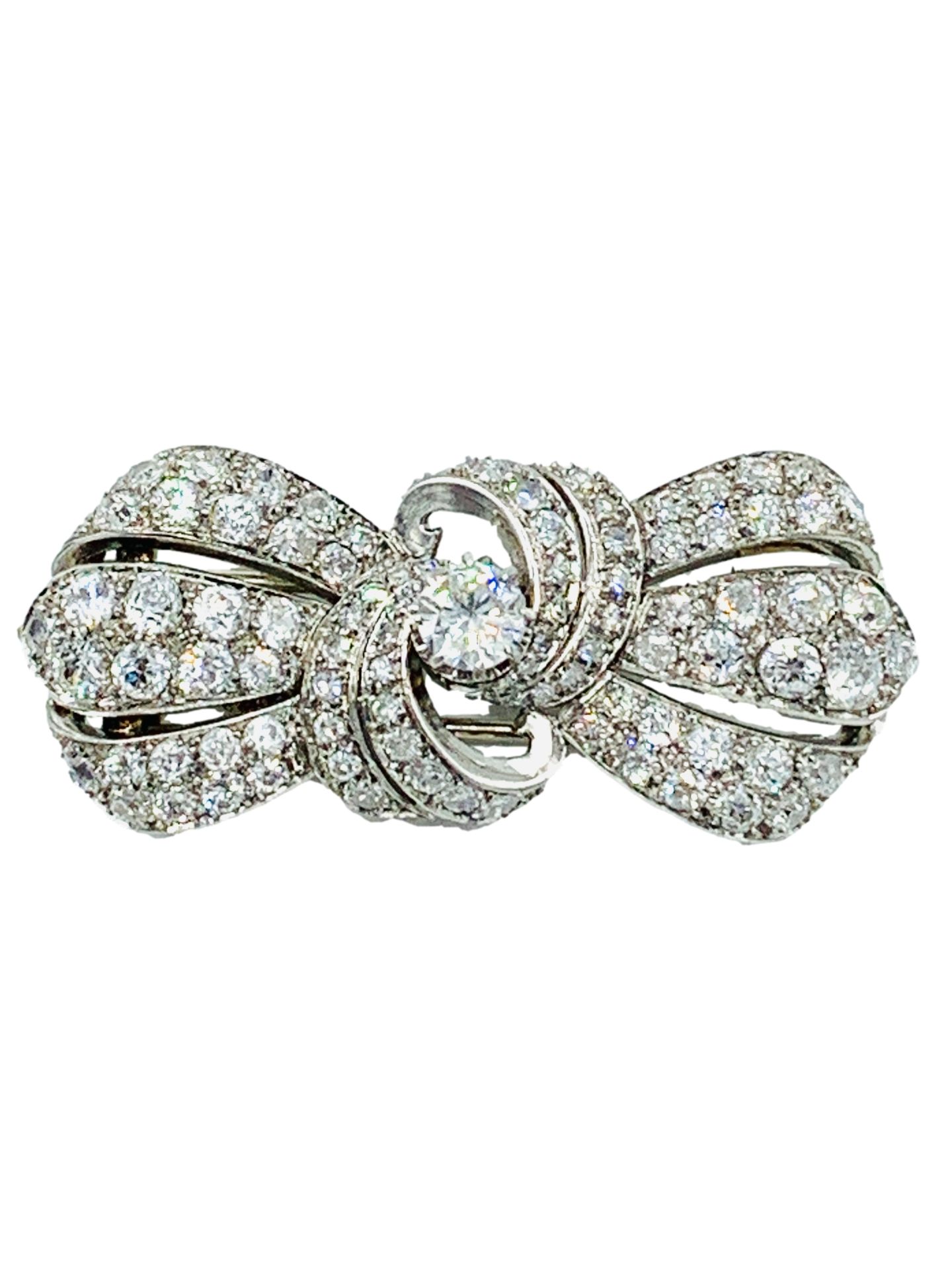 18ct gold and diamond clip brooch, centre stone approximately 1.3ct