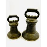 Two Avoir brass alloy bell proof weights: 56lbs and 28lbs