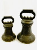 Two Avoir brass alloy bell proof weights: 56lbs and 28lbs