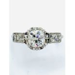 18ct white gold single stone diamond ring with diamond shoulders