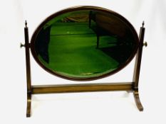 Mahogany framed oval bevelled edge toilet mirror on stand