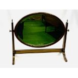 Mahogany framed oval bevelled edge toilet mirror on stand