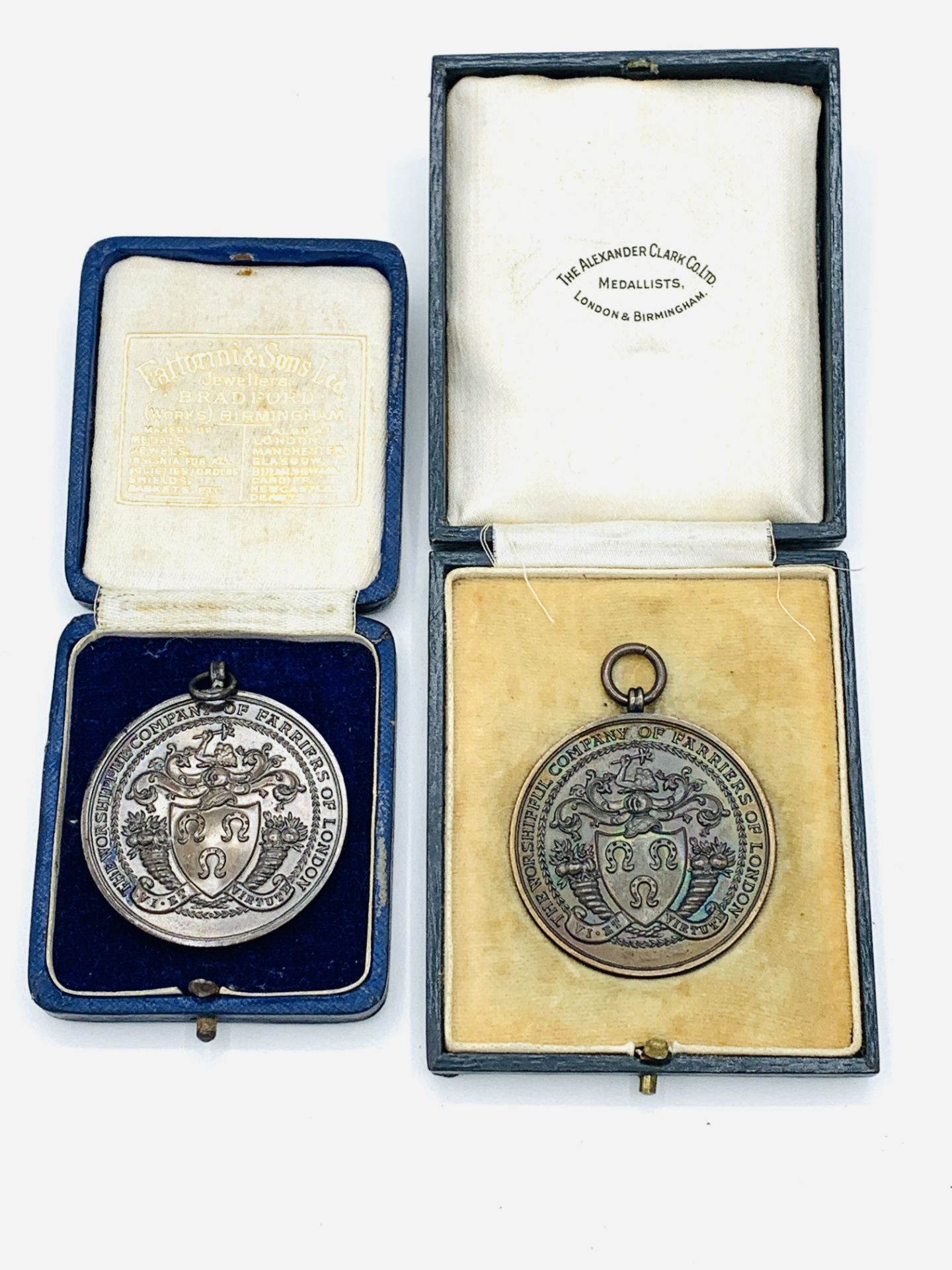 Two bronze medals with coat of arms and inscribed "The Worshipful Company of Farriers of London" - Image 2 of 2