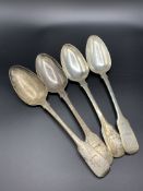 Four Georgian fiddle pattern silver table spoons