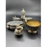 Silver small cream jug with fluted sides and other silver items