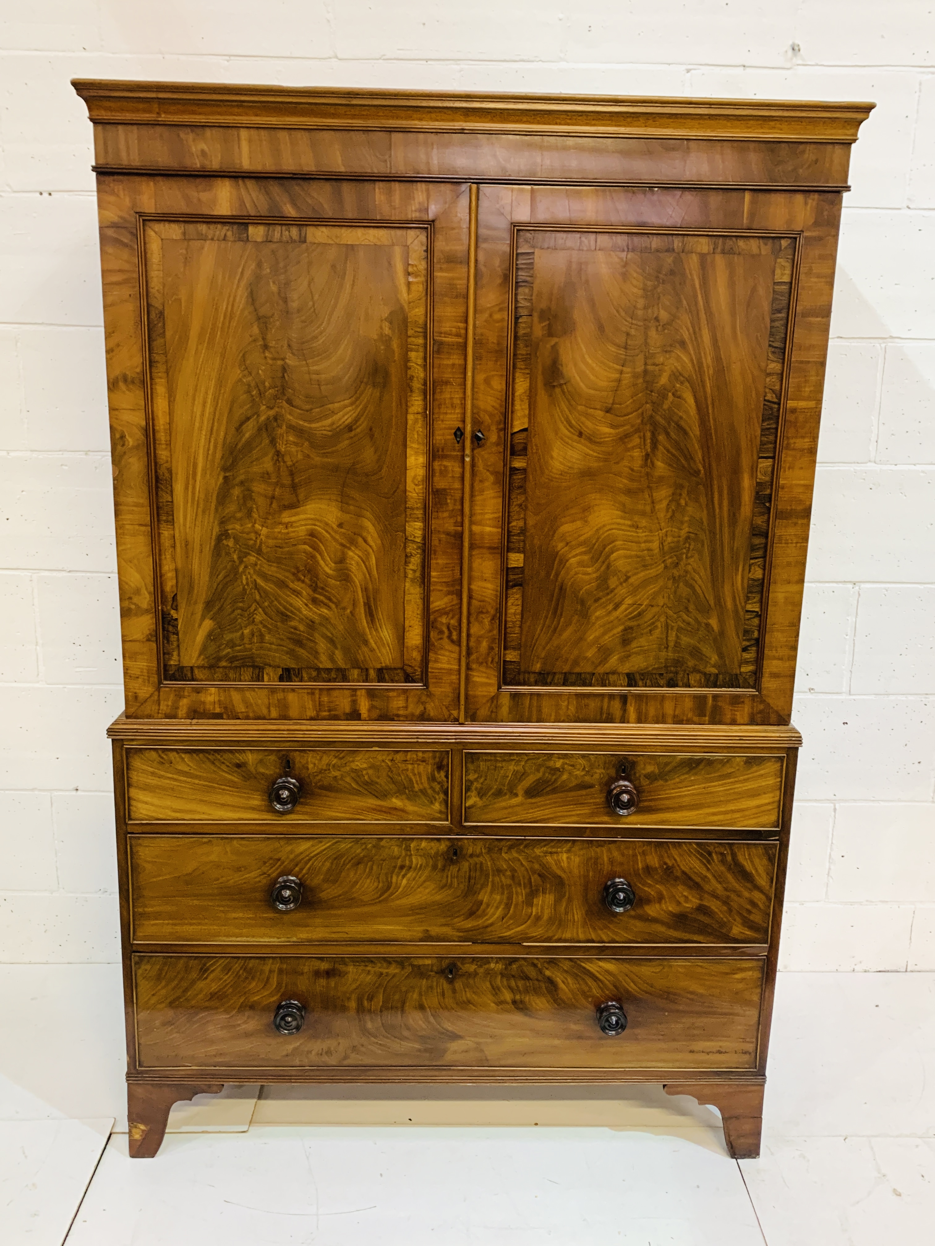 Victorian flame mahogany linen press