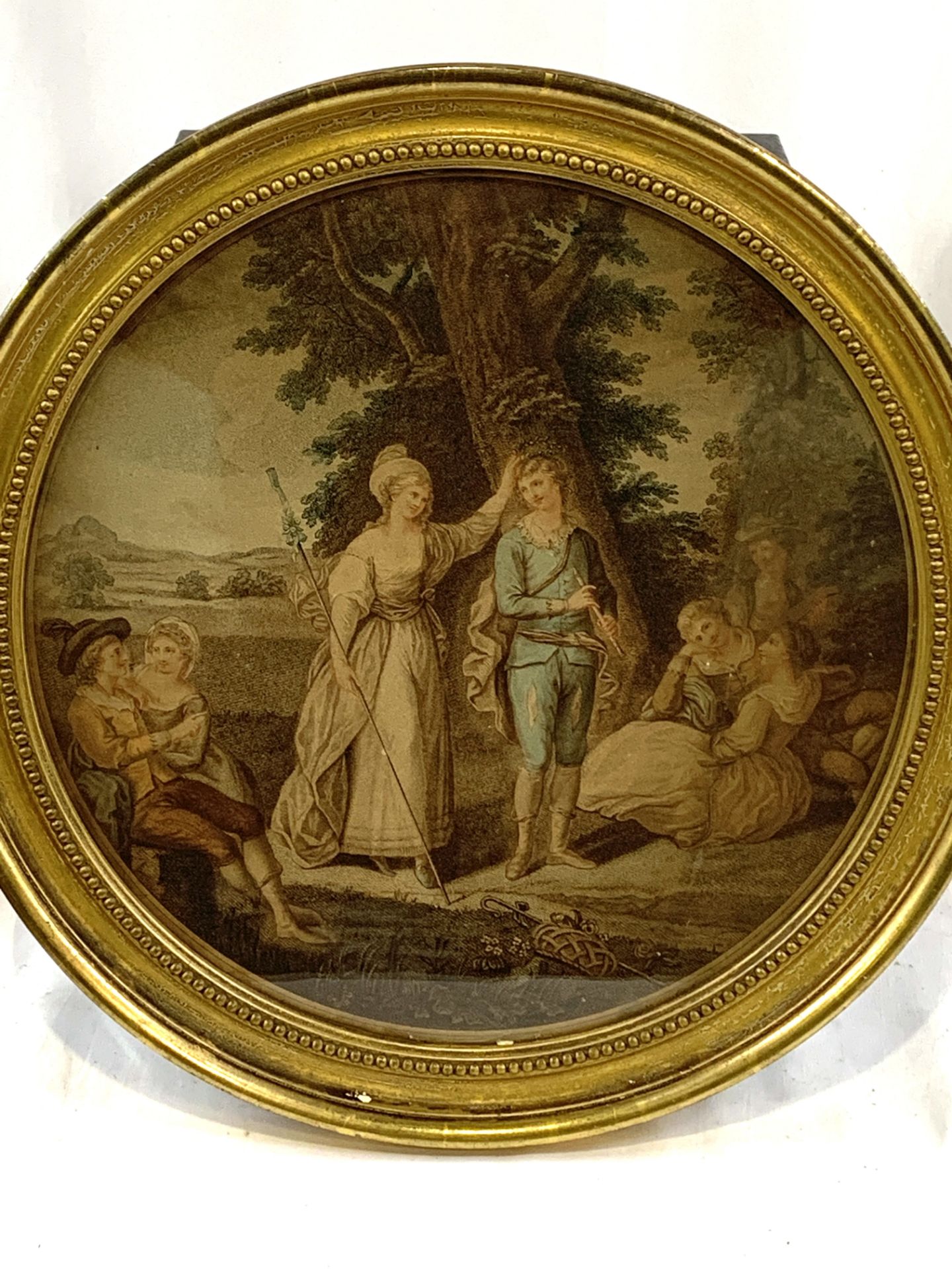 Four circular gilt framed and glazed prints of scenes from Shakespeare plays