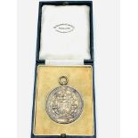 Silver medal with coat of arms and inscribed "The Worshipful Company of Farriers of London"