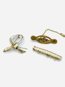 Three gold brooches