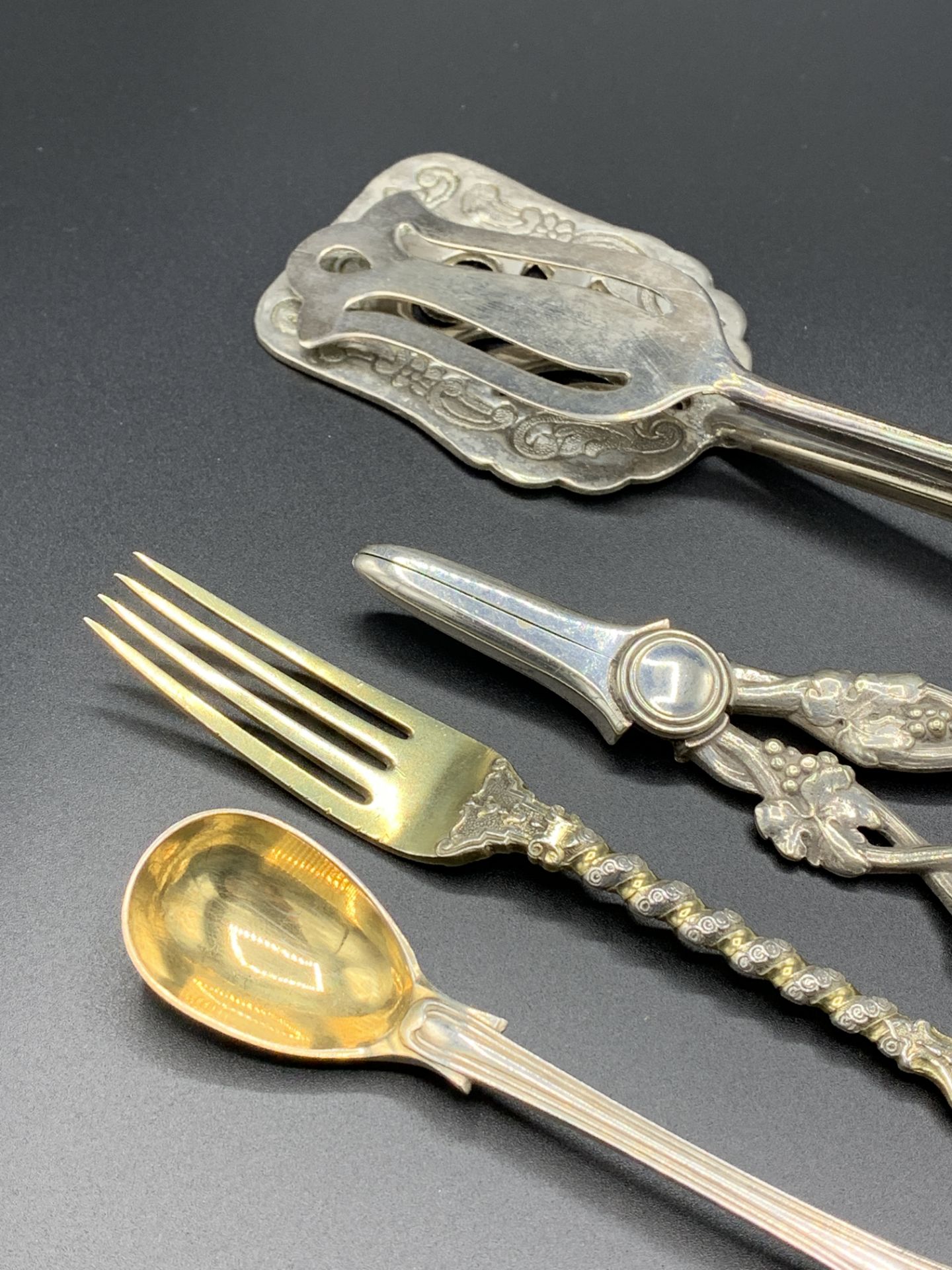 Very decorative silver gilt Victorian dessert fork and three other pieces of silver cutlery - Image 2 of 3