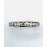 White gold and diamond half eternity ring