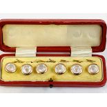 Set of 6 gilt metal and mother of pearl dress shirt buttons, in original red leather case