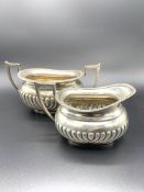 Sterling silver creamer and sugar bowl