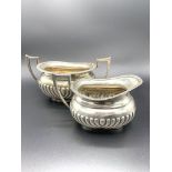 Sterling silver creamer and sugar bowl