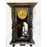 Vienna chiming wall clock in mahogany columned case