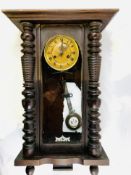 Vienna chiming wall clock in mahogany columned case