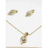 9ct gold and diamond pendant on chain with matching earrings